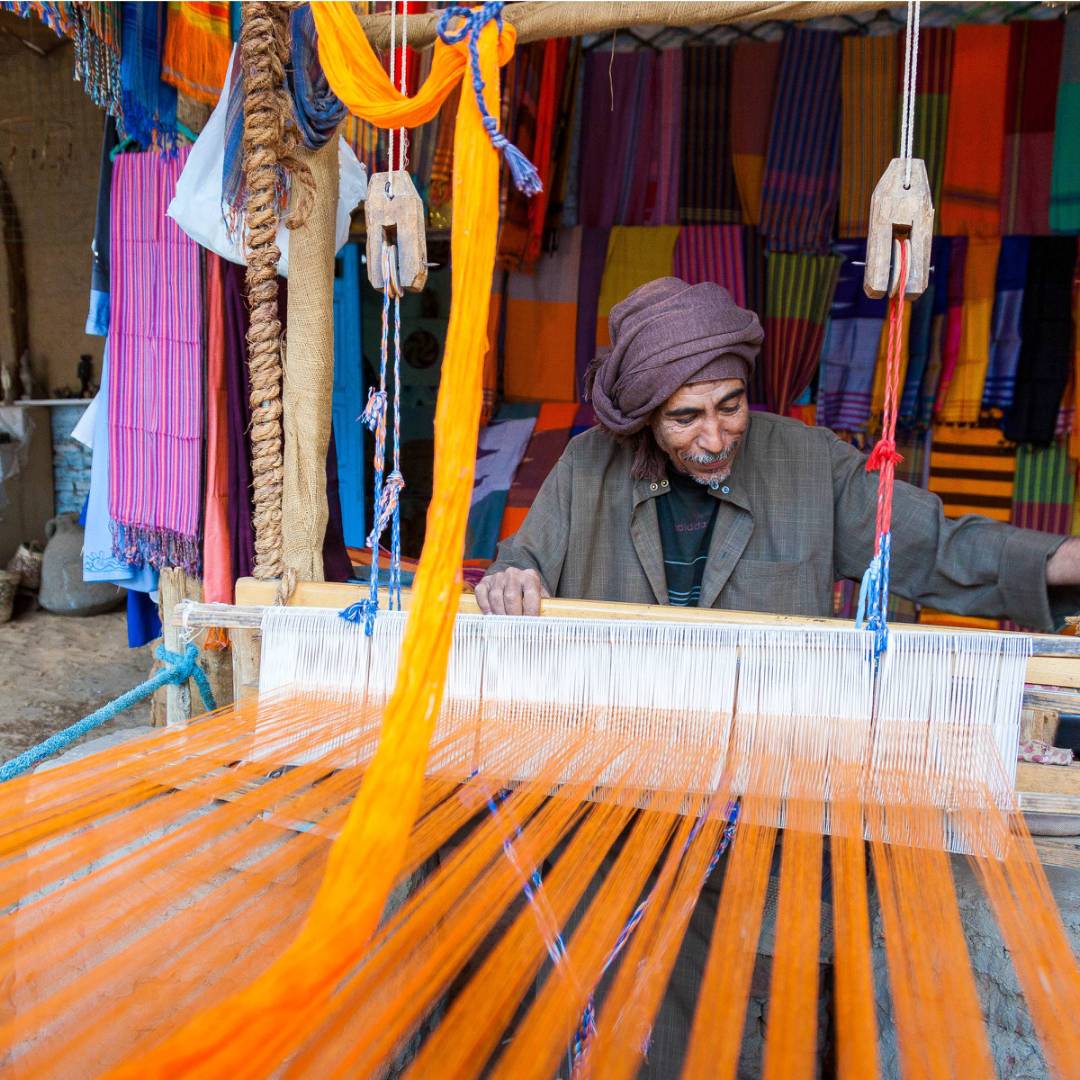 Egyptian weaver working on his loom | Richard I'Anson