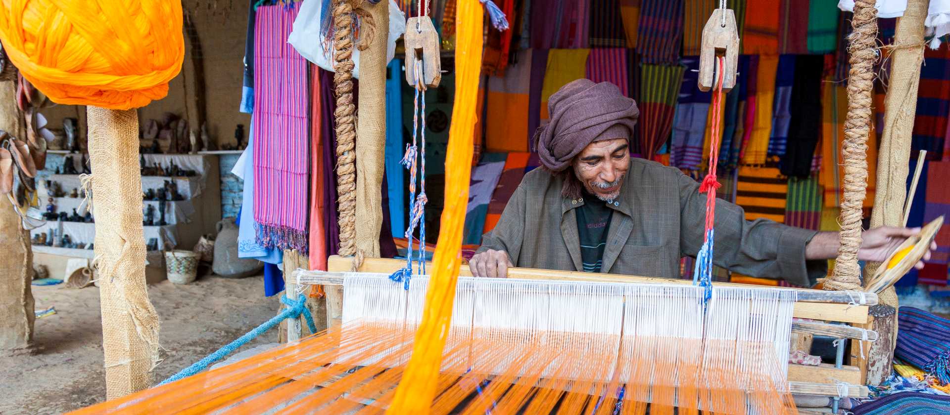 Egyptian weaver working on his loom | Richard I'Anson
