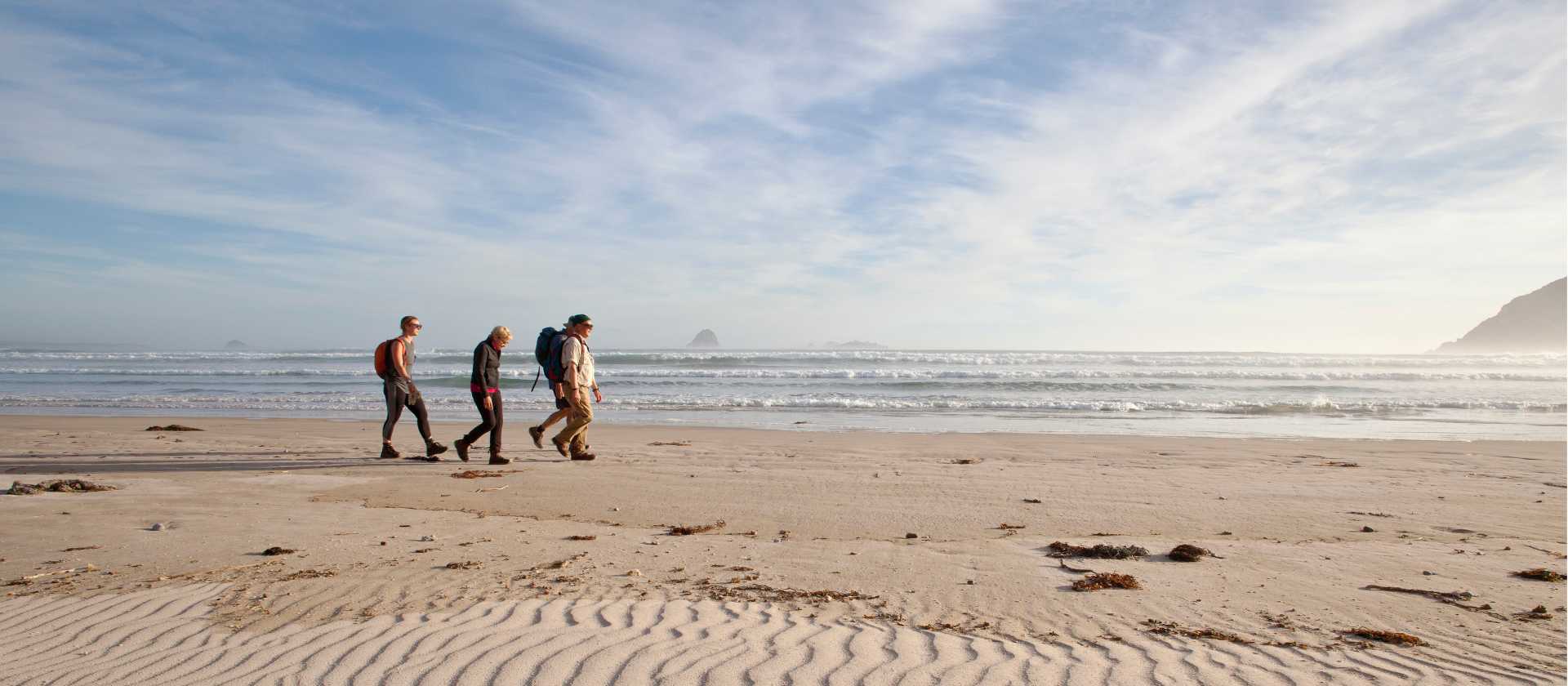 Guests walk along Stephens Bay, a remote beach | Mark Daffey