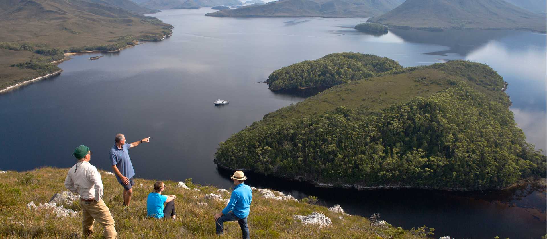 Guide and guests on Balmoral Hill, Port Davey