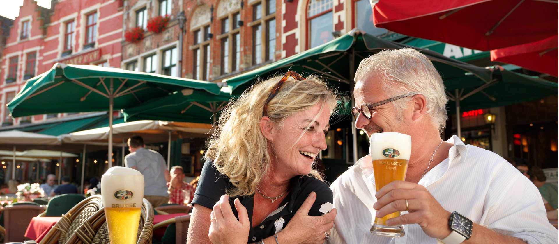 A happy couple enjoying their holiday in Belgium.