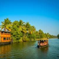 Cruise the stunning Kerala Backwaters in comfort