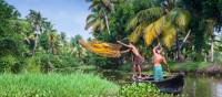 Villagers fishing in the backwaters near Kerala | Richard I'Anson
