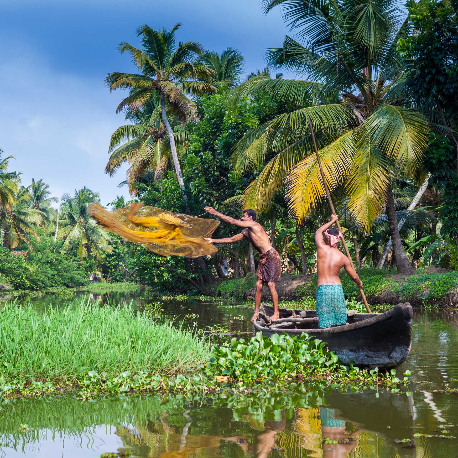 Villagers fishing in the backwaters near Kerala | Richard I'Anson