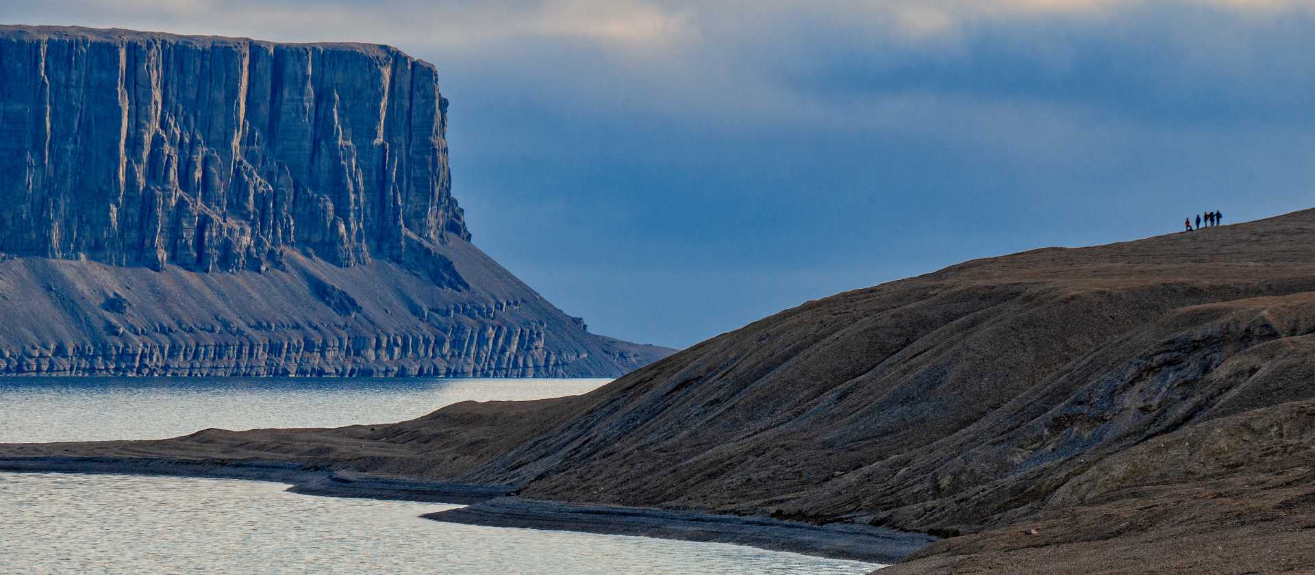 On Devon Island, silence stretches across ancient slopes and towering cliffs | Dennis Minty