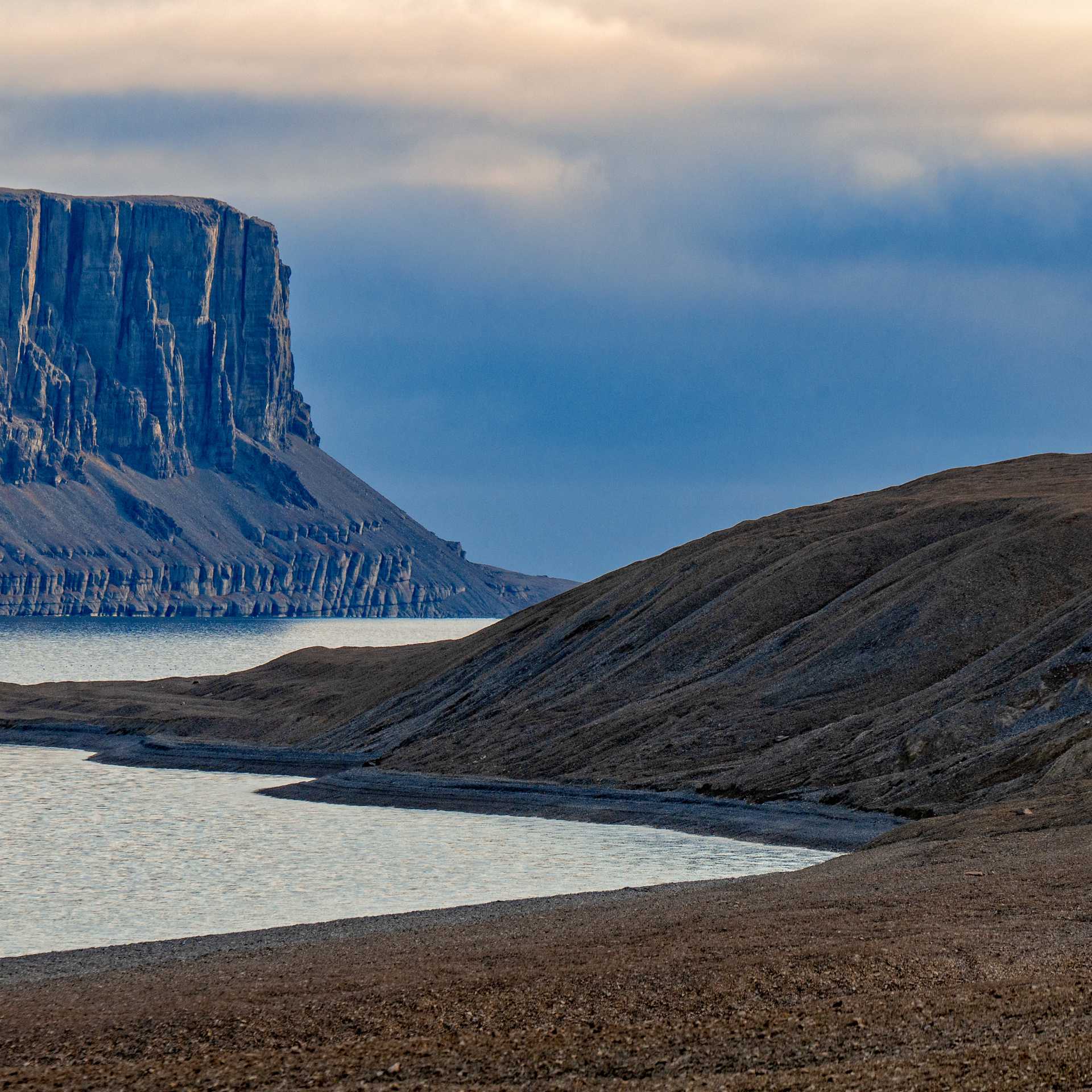 On Devon Island, silence stretches across ancient slopes and towering cliffs | Dennis Minty