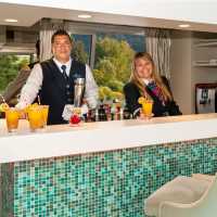 Enjoy a drink from the bar