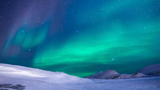 Northern lights dance across the sky for a spectacular ethereal display