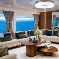 The comfortable lounge area with large windows to take in the view