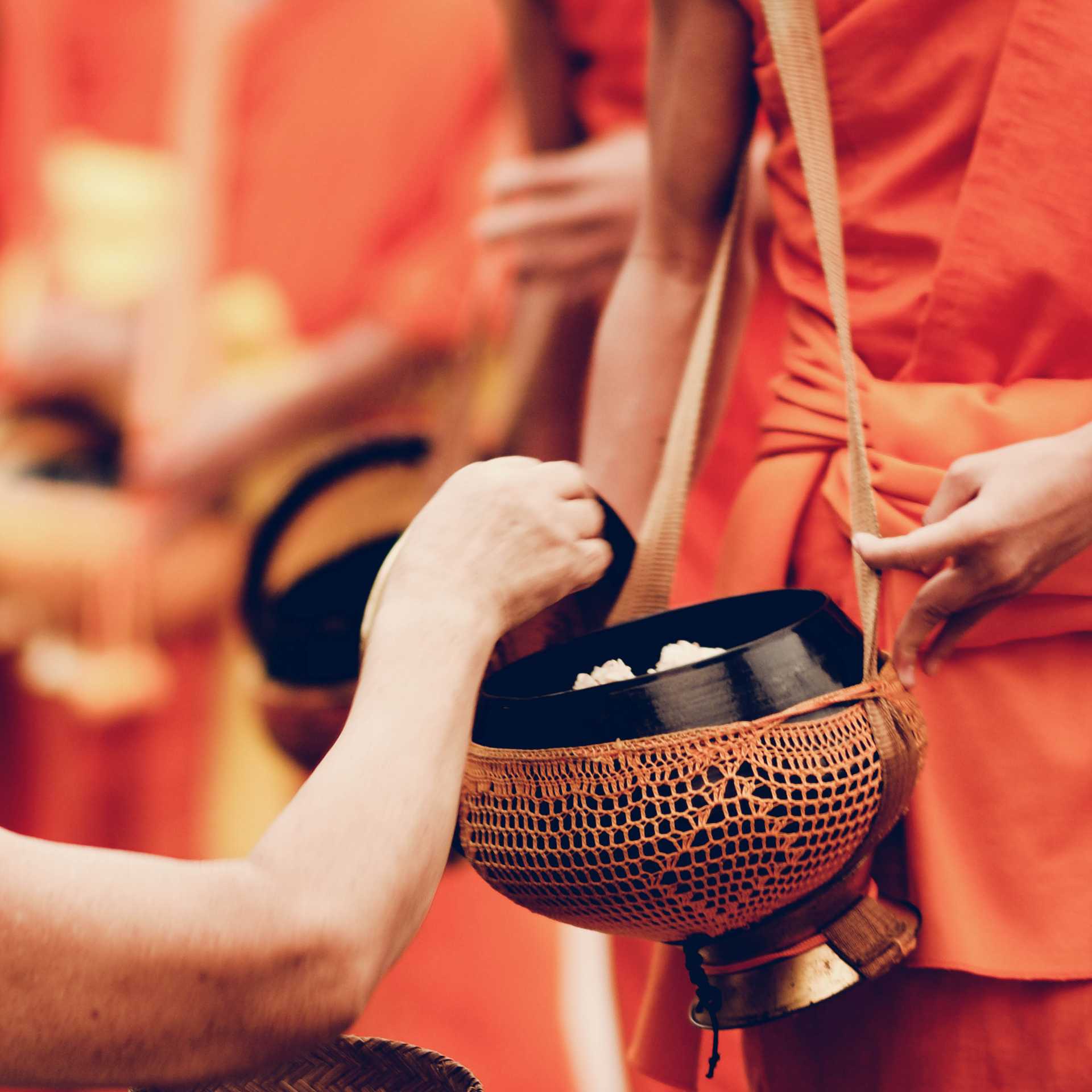 Alms giving, Laos