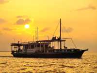A traditional 'dhoni' sailing the Maldives
