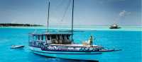 A traditional dhoni cruise is the best way to explore the turquoise waters of the Maldives