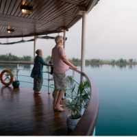 Watch life cruise by from the wrap-around promenade decks