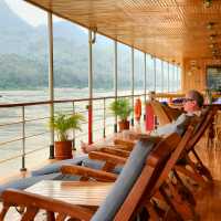 Watch life drift by from the upper deck