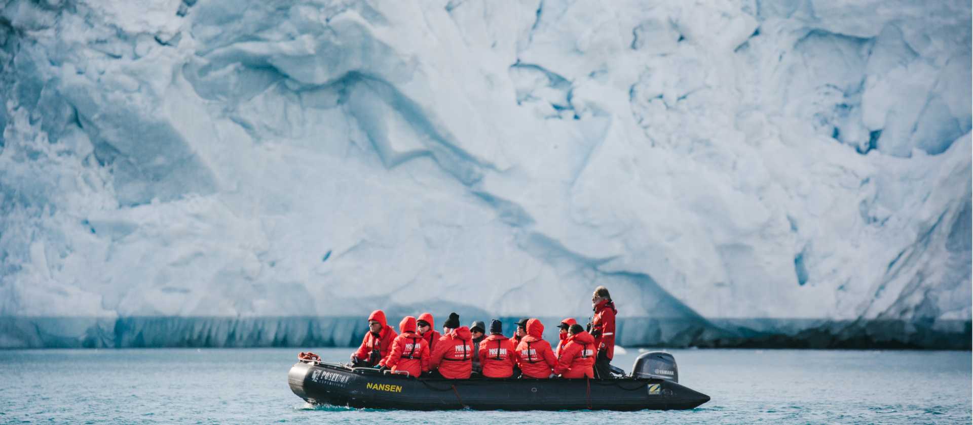 Zodiac cruising in Svalbard | John Bozinov