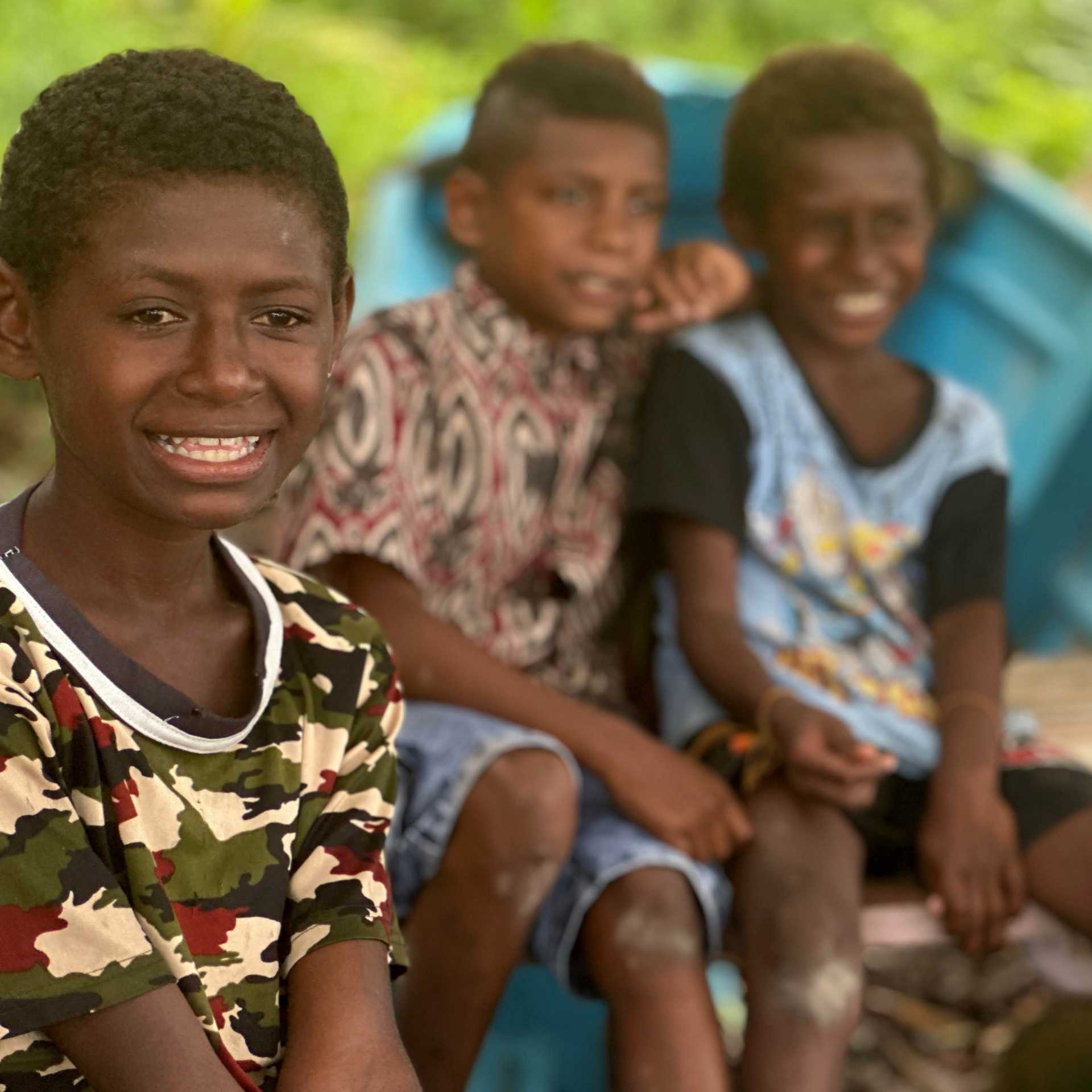 Smiling faces Lobo Village, West Papua | Rachel Imber