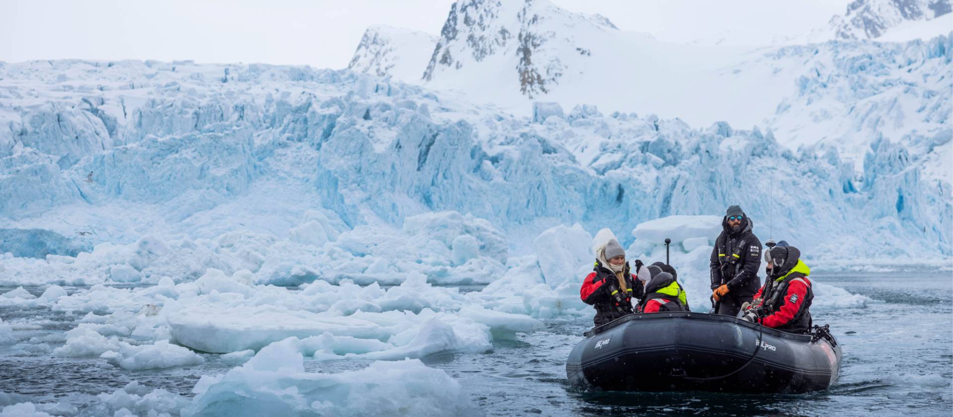 Zodiac cruising, Svalbard | Chase Teron