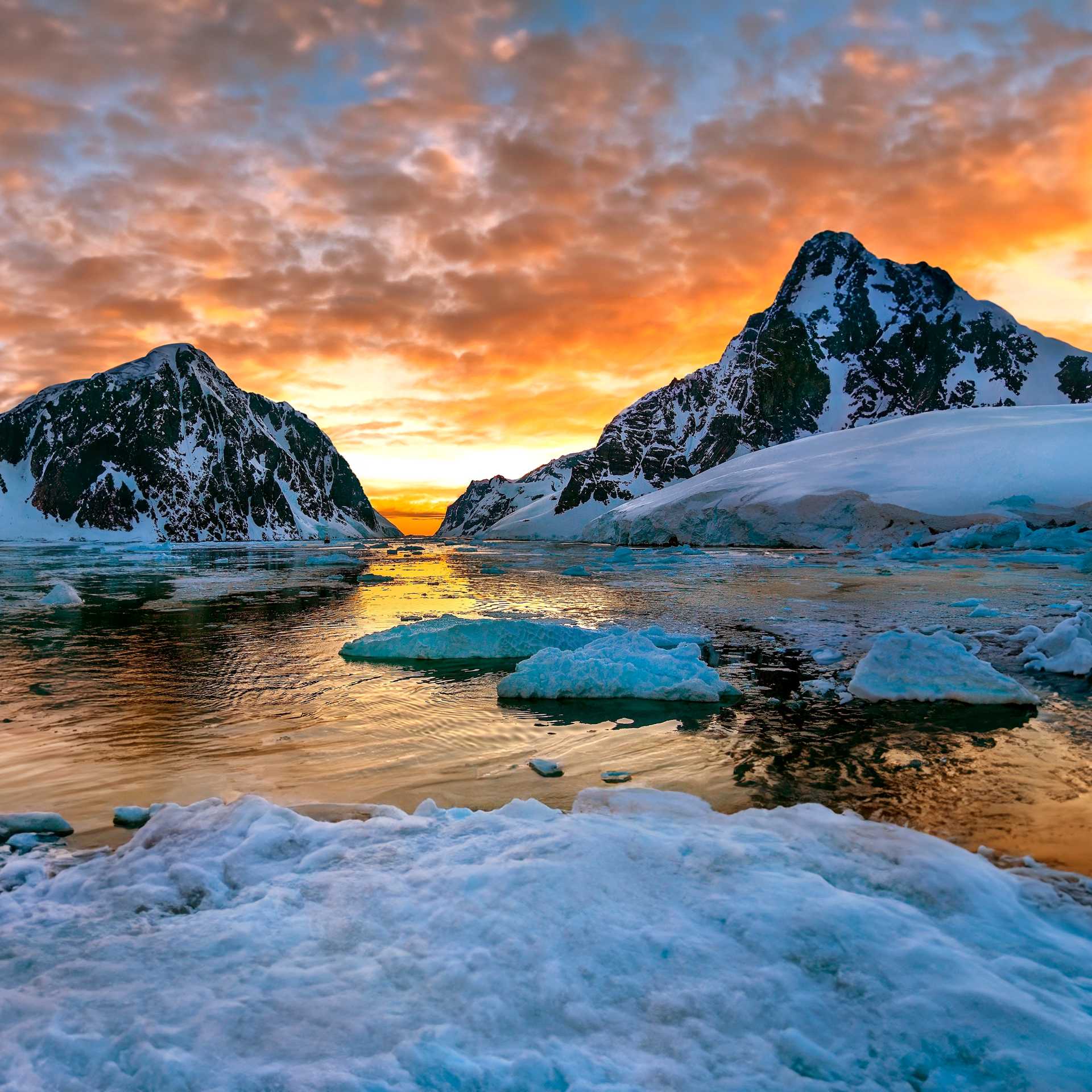 Midnight sun over the entrance to the Lemaire Channel