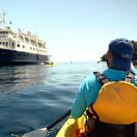 Explore by kayak and return to your floating home