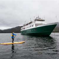Paddle boarding near Wilderness Explorer