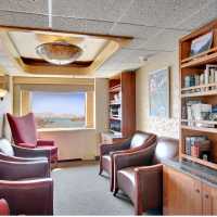 A handy onboard library with reference books on the region