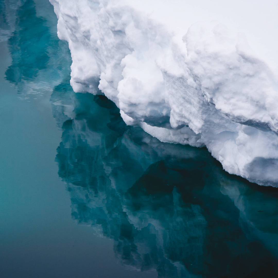 Reflections of an iceberg, Commonwealth Bay, Antarctica | Kylie Jones