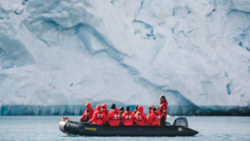 Zodiac cruising in Svalbard | John Bozinov