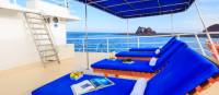 The main deck is a perfect spot to relax and enjoy the stunning surrounds in the Galapagos Islands
