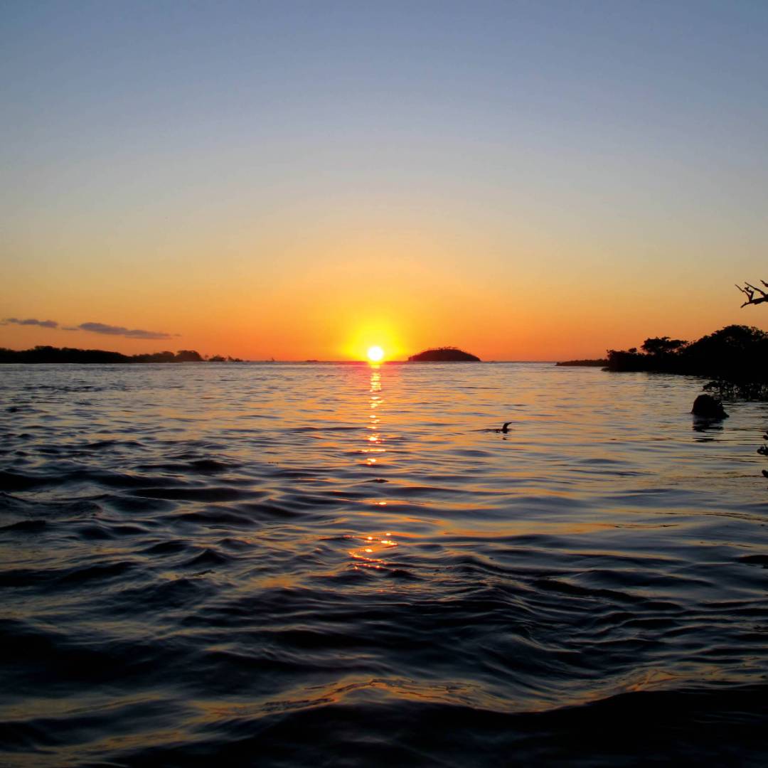 Breathtaking sunset from the beach front of Galapagos | Kate Harper