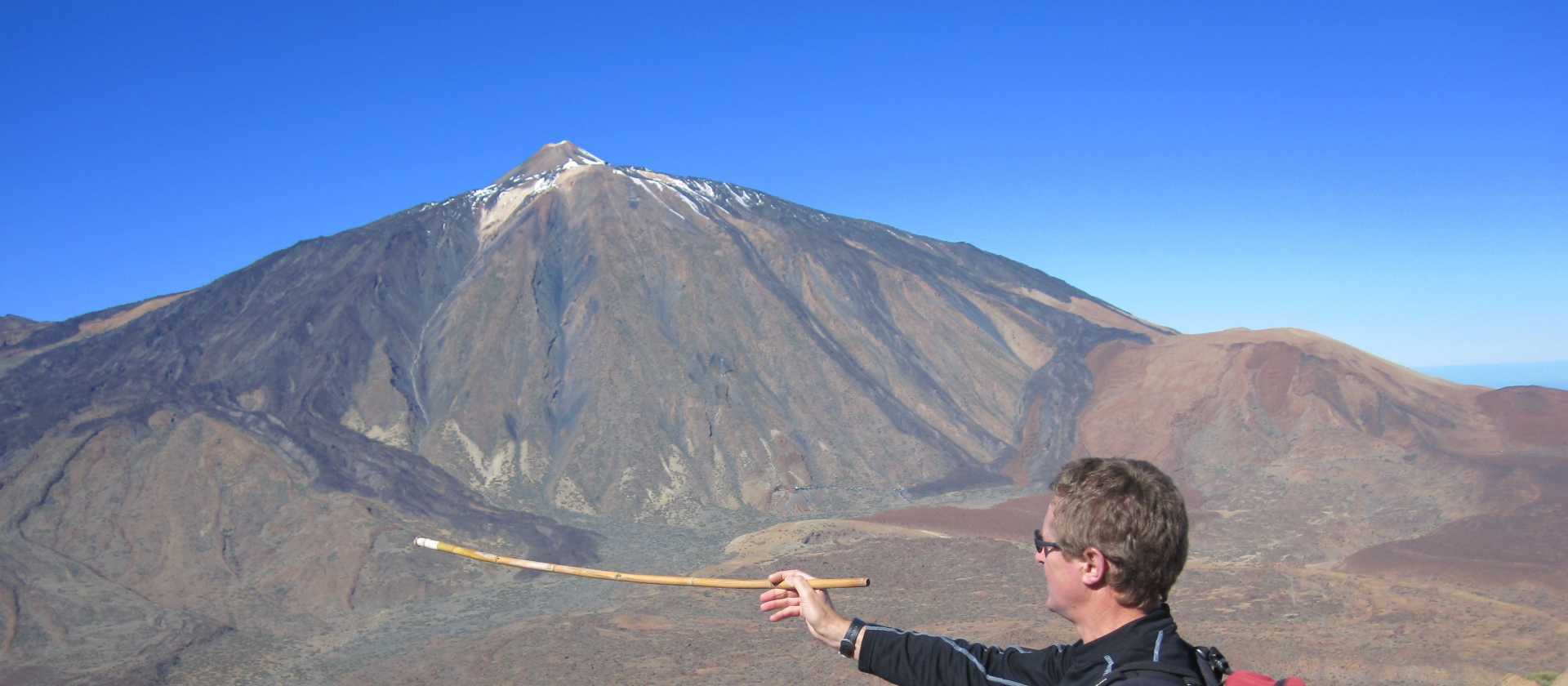 Pointing out Mount Teide, Tenerife