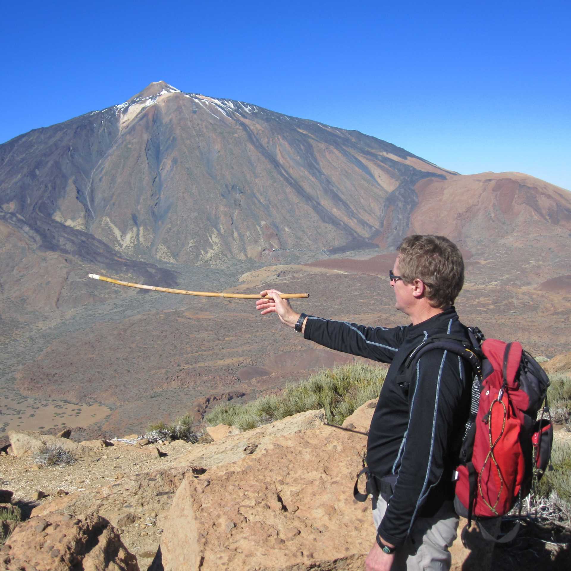 Pointing out Mount Teide, Tenerife